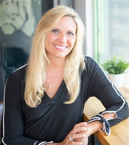 Image of CEO, Deb Rishel, at Paradigm Digital Group offices