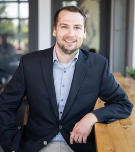 Image of Video Editor, Eric Knifong, at Paradigm Digital Group offices