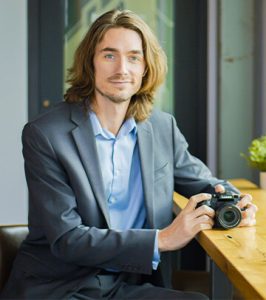 Image of Videographer and Editor, Evan Castor, at Paradigm Digital Group offices